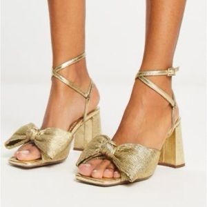 ASOS design hitched bow detail mid heeled sandals in gold